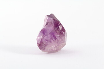 Fototapeta premium amethyst mineral with white background. purple crystal