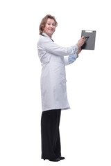 Female doctor smiling and showing a clipboard with an empty document