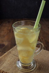 wedang tape or wedang tapai, traditional drink from fermented cassava doused with warm water then stirred and served warm.