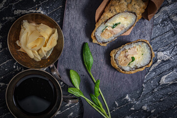 Still life. Japanese cuisine- roll in a package