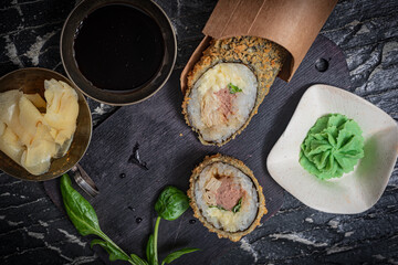 Still life. Japanese cuisine- roll in a package