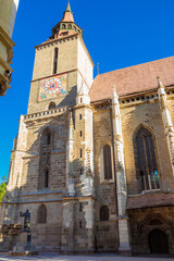 Image of Black Church built in medieval times in Council Square in downtown of Brasov, Transylvania. Brasov at summertime. The tower of the saxon Black Church in Romania. travel to Eastern Europe.