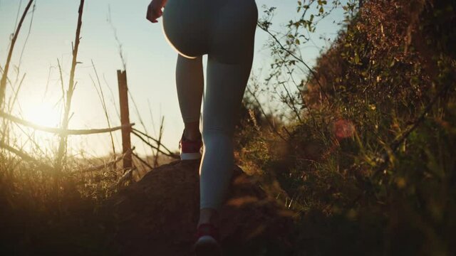 young spanish woman doing sport at the beach in the mediterranean sea