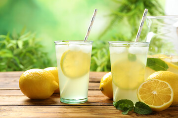 Natural lemonade with mint on wooden table. Summer refreshing drink