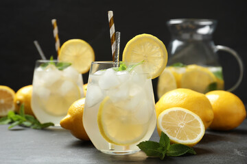 Natural lemonade with mint on grey table. Summer refreshing drink