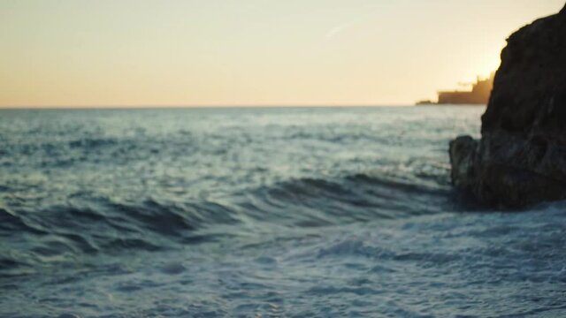 young spanish woman doing sport at the beach in the mediterranean sea