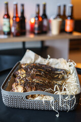 Baked dry fish, namely crucian carp on a background of beer in the bar