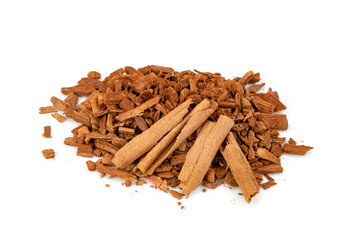 broken cinnamon sticks isolated on white background