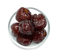 Chinese date or Jujube or monkey apple in syrup with glass bowl isolated on white background