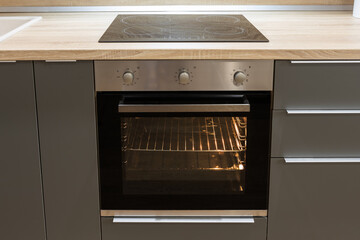 electric hob and oven in the kitchen