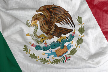 Fototapeta na wymiar The Mexican flag is a vertical triband with in the center an enblem. The used colors in the flag are red, white, green.