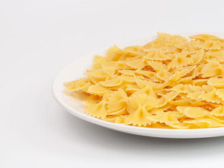Pasta farfalle butterfly on the white