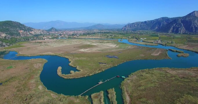 drone footage of dalyan river and cith with lyvian rock tombes fethiye turkey
