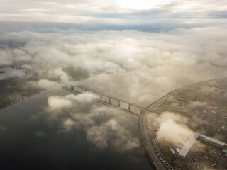Aerial drone view. Railway bridge in Kiev, shrouded in morning fog.