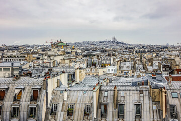 Fototapeta premium Paris Panorama. Montmartre hill with Sacre-Coeur Cathedral in the background. Paris, France.