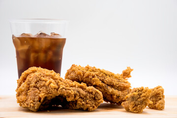Fried chicken put near ice water for meal.