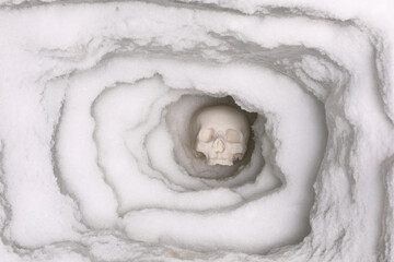 Fototapeta premium halloween human skull in ice cave
