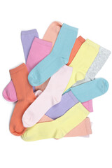 Lot of multicolored children's socks without pattern, isolated on white background, flatly, minimal style. Concept children's clothing, housekeeping, washing, sorting, decluttering, organizing space