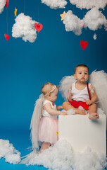 Two young angel children on Valentine's Day