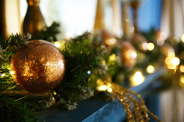 Bright New Year's Christmas lights, balls and toys hang on the tree and shimmer in different colors