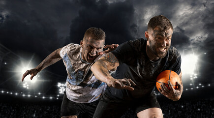 Two rugby players in action