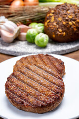 Grilled plant based, meat free vega burgers close up