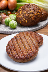 Grilled plant based, meat free vega burgers close up