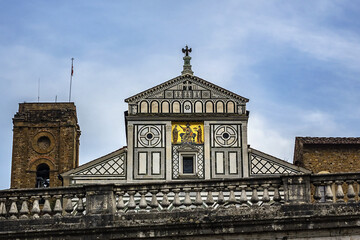 Church St. Minias on the Mountain (San Miniato al Monte) decorated with green and white marble in geometric patterns is oldest church of Florence - XI century. Florence, Tuscany, Italy.
