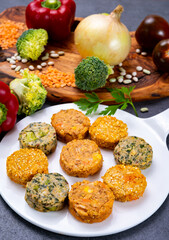 Small tasty vegan and vegetarian burgers made from fresh vegetables and dried legumes and beans