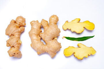 Fresh ginger rhizome root used in traditional medicines and for flavoring meals isolated on white