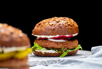 Grilled plant based, meat free vega burgers close up