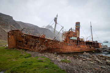 An old rusty ship at an abandoned whaling base in Grytviken. South Georgia.