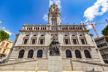 Fototapeta na wymiar Front view of The Camara Municipal (City Hall). City Hall with a monumental tower is one of Porto’s landmarks. Portugal.