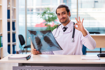 Young male doctor radiologist working in the clinic