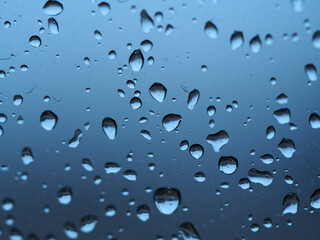 cold rain drops on the glass