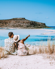couple men and woman mid age on vacation at the Greek Island Crete. Europe