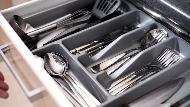 Clean And Tidy Kitchenware In A Drawer In The Kitchen