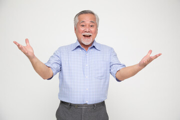 Portrait of excited screaming senior asian man isolated over white background, Wow and surprised...