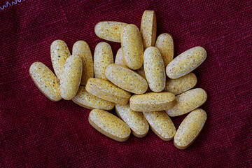 close-up of multivitamin and mineral supplement tablets. dietary concept. dietary supplement topview.