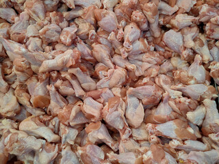 Fresh chicken drumsticks in the market, Raw material food.
