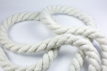 White cotton rope curl on white background.