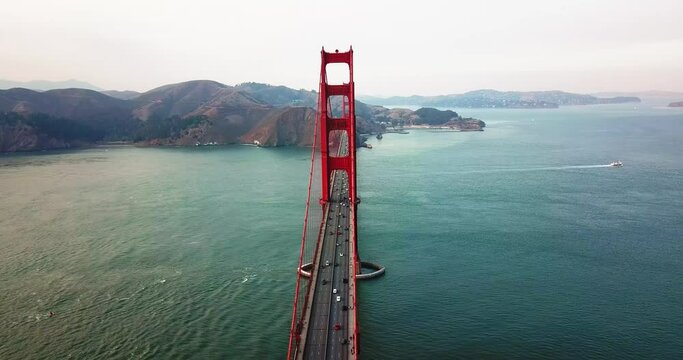 Steady aerial footage of Golden Gate bridge in San Francisco, California state of United States of America at sunset