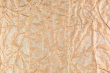 Rumpled beige background. Real texture of the wrapping texture.