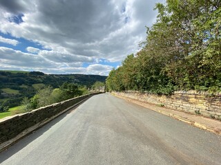 View down, Blake Hill, with dry stone walls, fields and trees in, Halifax, Yorkshire, UK