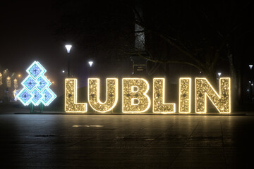 Illuminated inscription Lublin on Litewski Square in Lublin