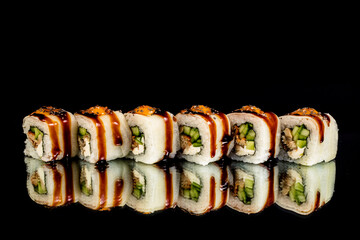 sushi with fish and vegetable ingredients