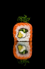 sushi with fish and vegetable ingredients