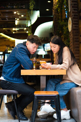 couple of friends in a cafe