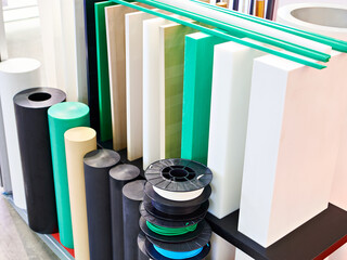 Pipes, rods and sheets of composite materials on exhibition