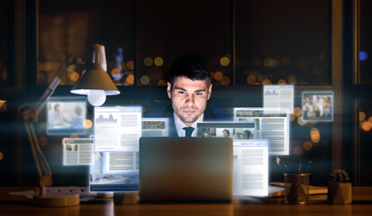 Obraz na płótnie Canvas Businessman Sitting At Laptop Networking In Social Media In Office